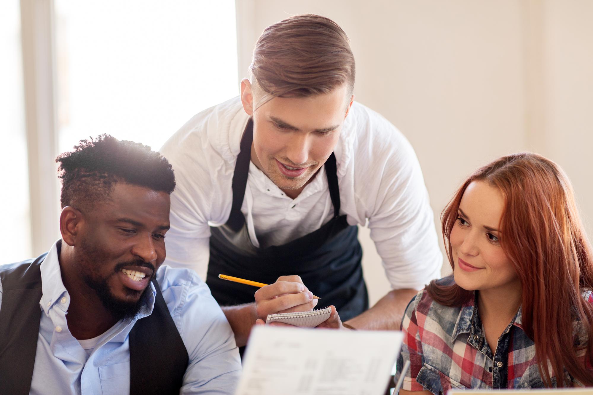 chef and client reviewing menu notes